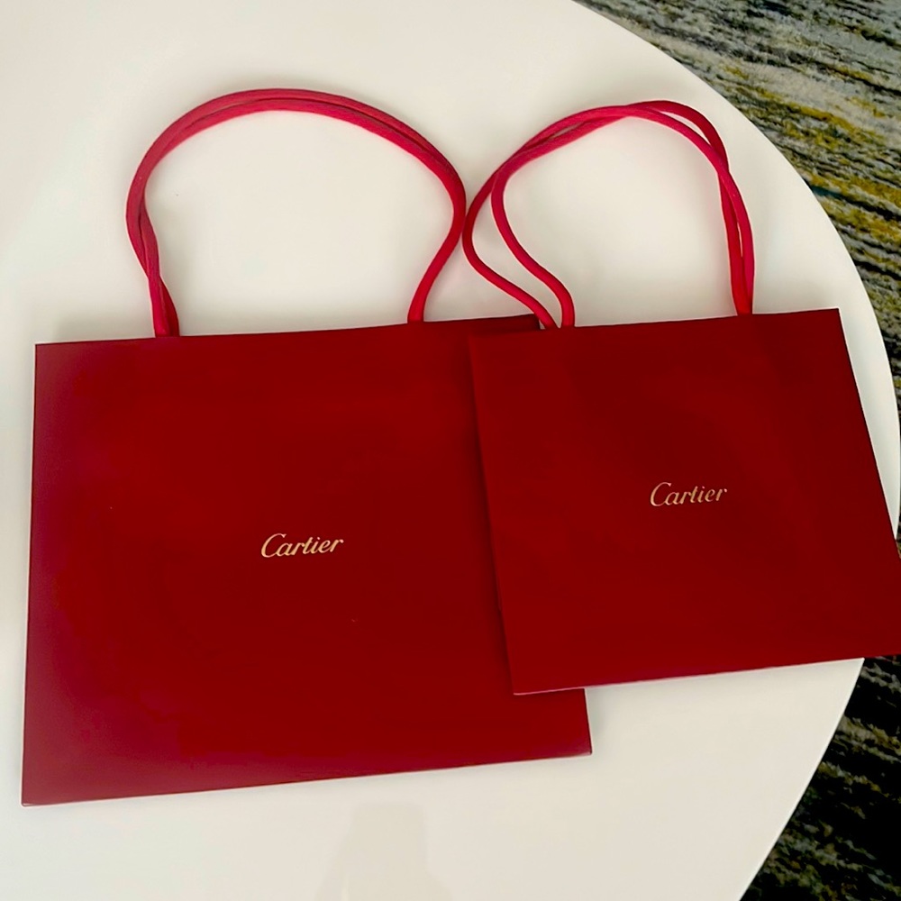 2 Cartier Shopping bags one 10’’x 9’’ one 7”x8”